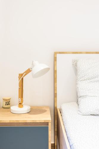 Postel nebo postele na pokoji v ubytování COSY MATTONI