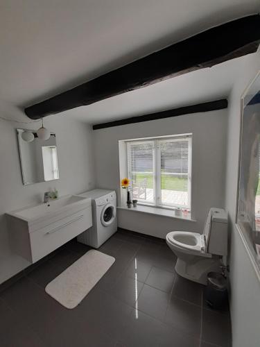 Ванная комната в Lille Knudsgaard