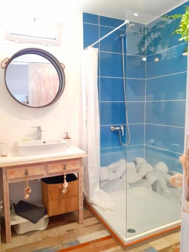 a bathroom with a shower and a sink at Los Ancones Apartment in Costa Teguise