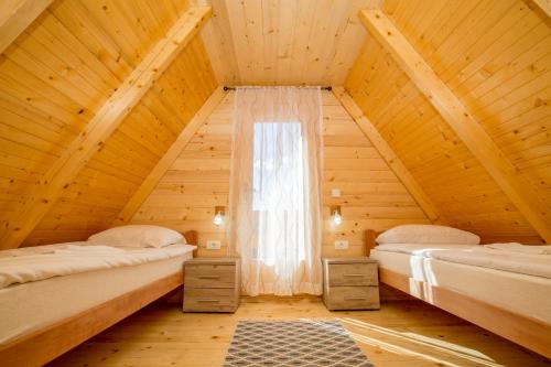 Una cama o camas en una habitación de Paradise Zabljak