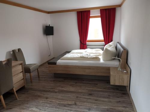 Postel nebo postele na pokoji v ubytování Hotel Oyer Hof - selbst Service