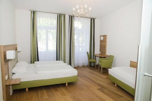 Кровать или кровати в номере Perkeo Apartments