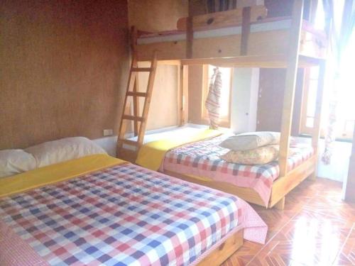 
A bunk bed or bunk beds in a room at Big Dipper Sagada
