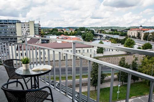 a view from a balcony overlooking a city at Art City Inn in Vilnius