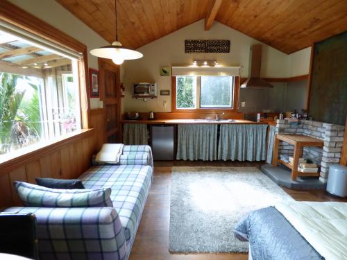 Kuchyň nebo kuchyňský kout v ubytování Hydrangea Cottages