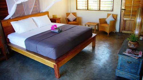 Krevet ili kreveti u jedinici u objektu Villa Tunggaoen