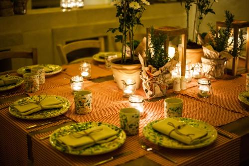 a table with plates of food on top of it at Borgo Egnazia in Savelletri di Fasano