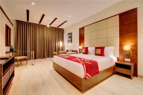 a bedroom with a large bed in a room at The Fern An Ecotel Hotel, Lonavala in Lonavala
