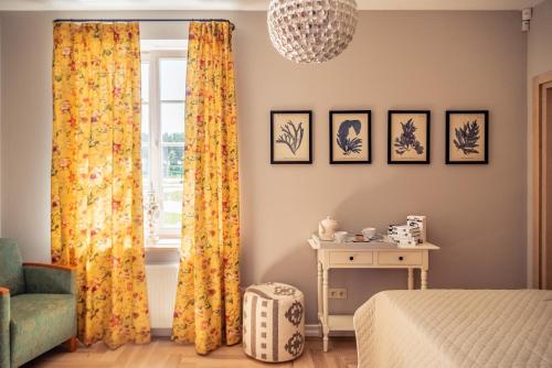 Χώρος καθιστικού στο Lake & Library boutique Hotel