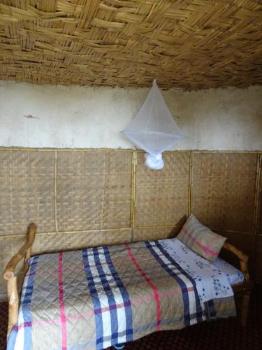 Łóżko lub łóżka w pokoju w obiekcie Mbunga Community Tourism Campsite