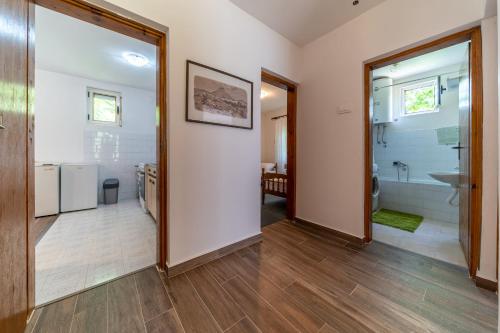 a room with a bathroom with a sink and a toilet at House Gorica in Bar