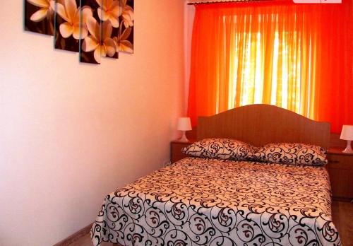 Кровать или кровати в номере Apartment on Pyrohova 25