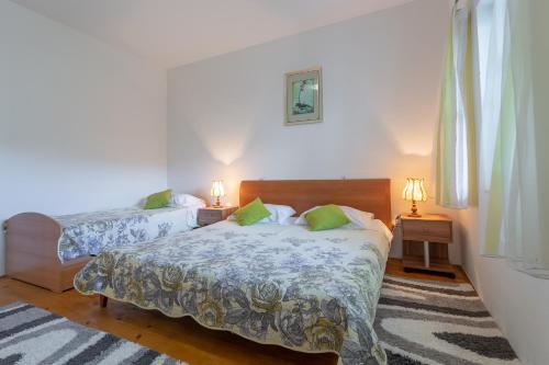 Postel nebo postele na pokoji v ubytování Holiday home Paradise