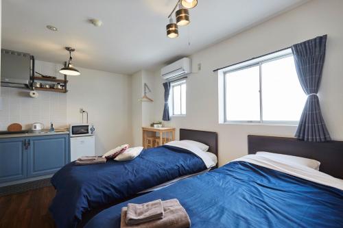 Katil atau katil-katil dalam bilik di Hostel Cuore Kurashiki