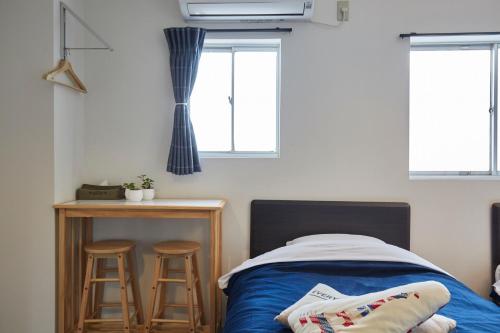 Katil atau katil-katil dalam bilik di Hostel Cuore Kurashiki