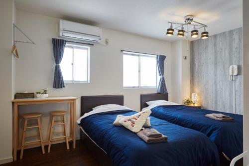 Katil atau katil-katil dalam bilik di Hostel Cuore Kurashiki