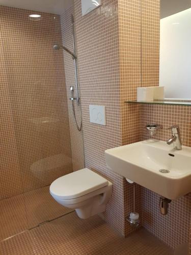 Ein Badezimmer in der Unterkunft Hotel Hinteregger