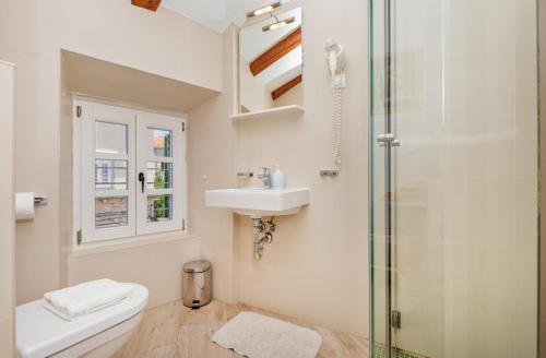 Ванна кімната в Ragusa City Walls Apartments