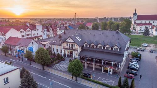 an overhead view of a town with a building at Hotel Kresowiak in Siemiatycze