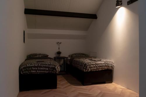 Кровать или кровати в номере Huis van Harderwijk