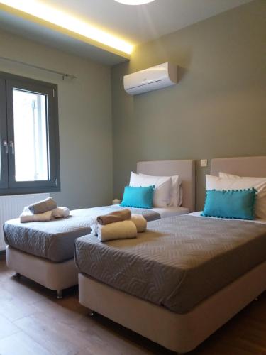 Un pat sau paturi într-o cameră la Villa Liberta