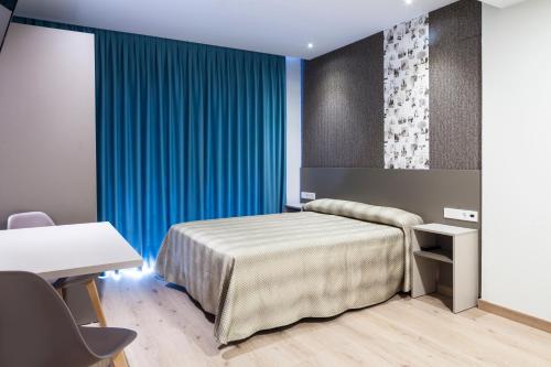 Postel nebo postele na pokoji v ubytování Climia 2Sleep Apartments