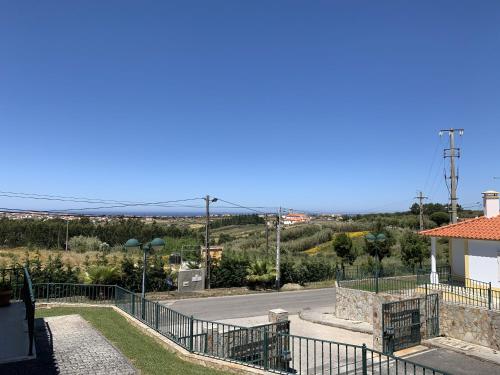 a view of a parking lot with a road at Santa Barbara Healthcare & Villas in Mariquiteira