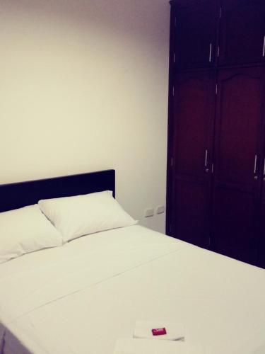 Cama o camas de una habitación en Hospedaje Tuuma