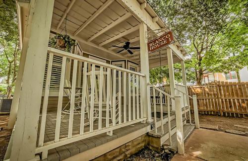 a porch of a house with a sign on it at The Kendall in Boerne
