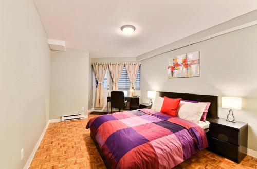 Кровать или кровати в номере APARTMENT HOTEL ST-DENIS