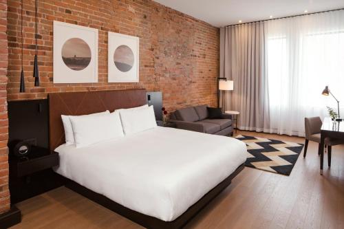 Кровать или кровати в номере Hotel Place D'Armes