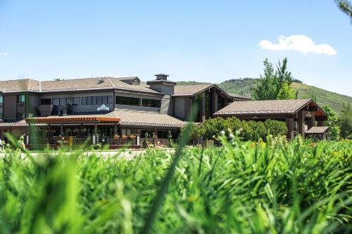 a building with grass in front of it at Park City Peaks in Park City