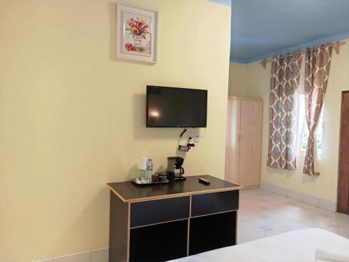 TV a/nebo společenská místnost v ubytování Sunshine View Hotel and Restaurant