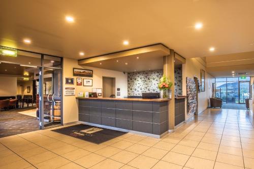 a large kitchen with a stainless steel counter top at McCracken Country Club in Victor Harbor