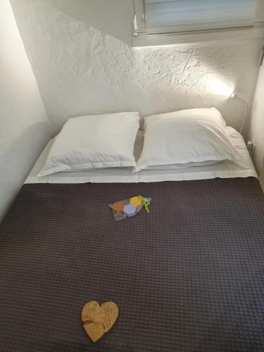 Łóżko lub łóżka w pokoju w obiekcie T2 rez de jardin front de mer