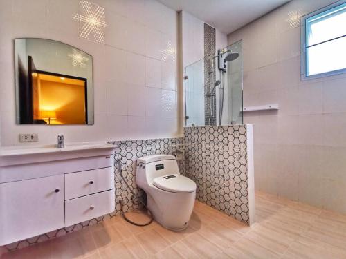 a bathroom with a toilet and a sink and a shower at Diamond Pool Villa@Samui in Koh Samui