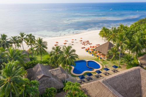 an aerial view of the beach and the ocean at South Palms Resort Panglao in Panglao Island