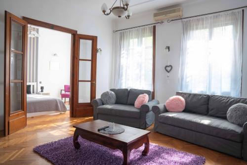 Coin salon dans l'établissement Katus Apartman