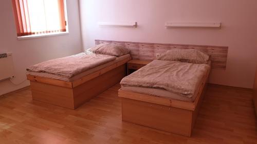 Postel nebo postele na pokoji v ubytování Na panskym