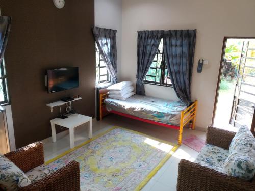 Postel nebo postele na pokoji v ubytování HMA Guesthouse