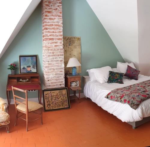 Postel nebo postele na pokoji v ubytování Bed & Breakfast - La closerie de la Fuye