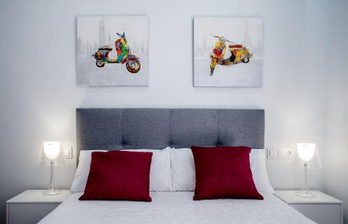 Postel nebo postele na pokoji v ubytování Apartamentos Turísticos Moret11-1A