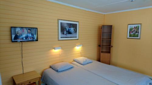 Postel nebo postele na pokoji v ubytování Bollegården B&B