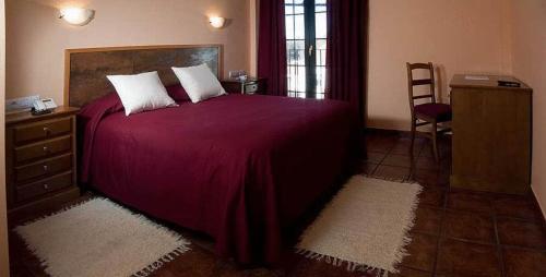 Posteľ alebo postele v izbe v ubytovaní Hotel Ruta del Poniente