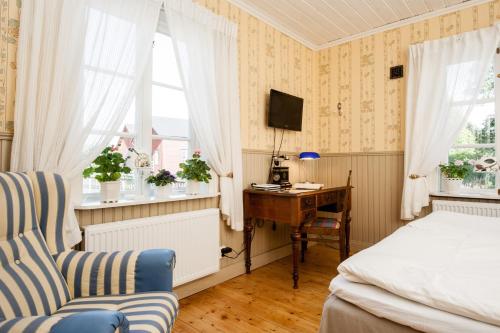 Postel nebo postele na pokoji v ubytování Enångers Bed and Breakfast
