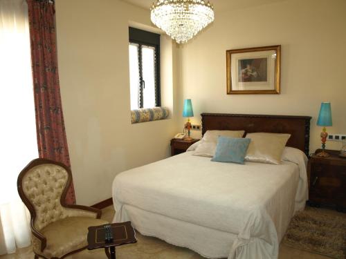 Posteľ alebo postele v izbe v ubytovaní Hotel Rural Las Águedas