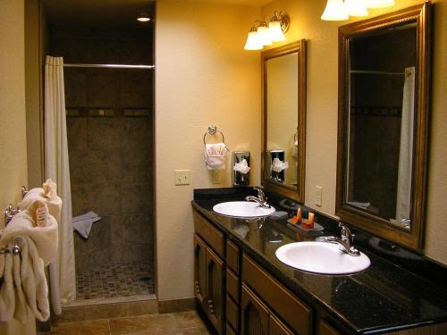 a bathroom with a sink and a mirror at Sedona Springs Resort, a VRI resort in Sedona