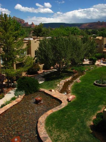 a landscaped yard with a stone walkway at Sedona Springs Resort in Sedona