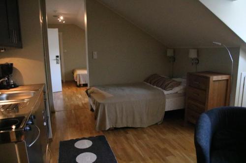 Cama o camas de una habitación en Myrkdalen Resort- studio apartment
