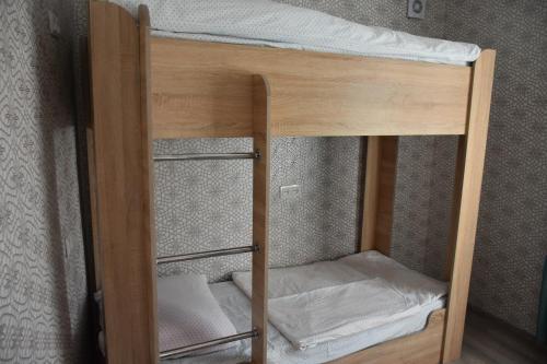 a bunk bed with two bunk beds in a room at Babulya House in Gyumri